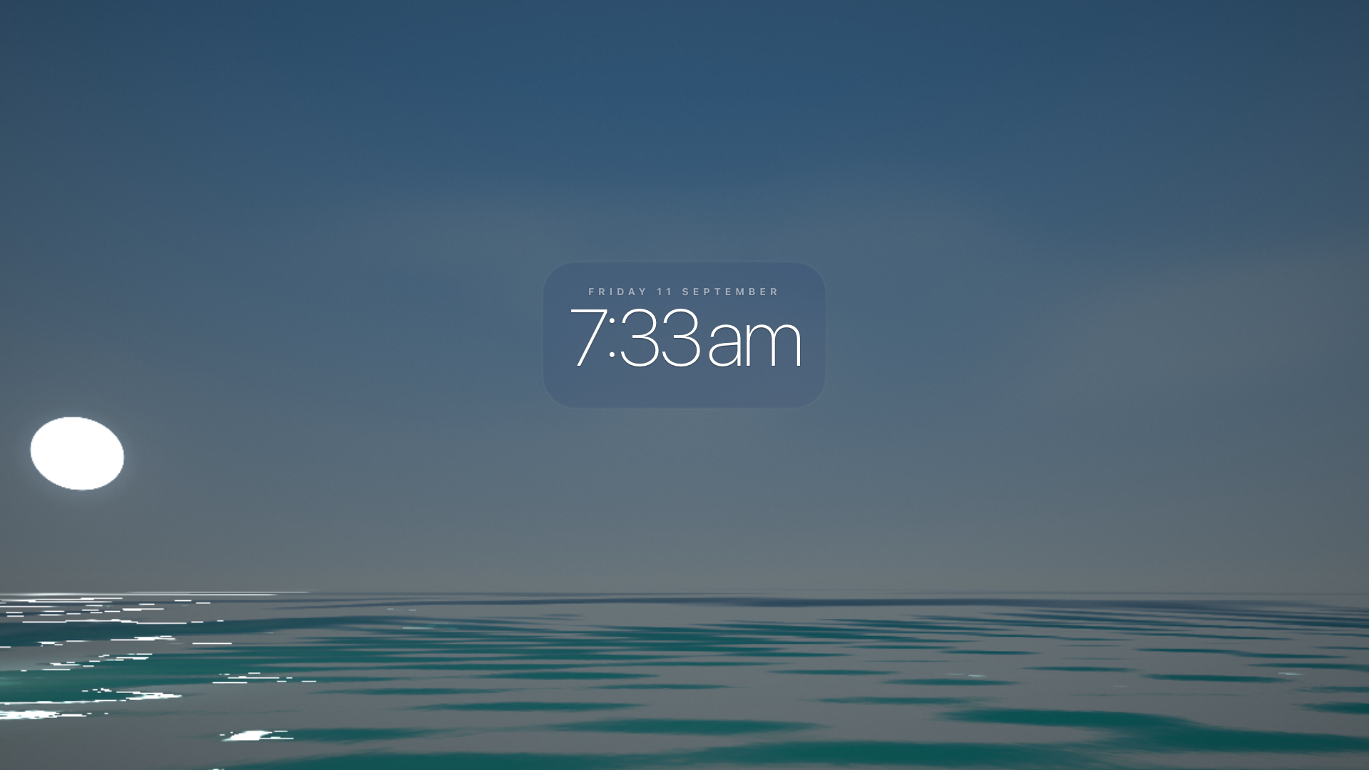 Ocean Clock at 7:33am, pale blue morning light over calm water