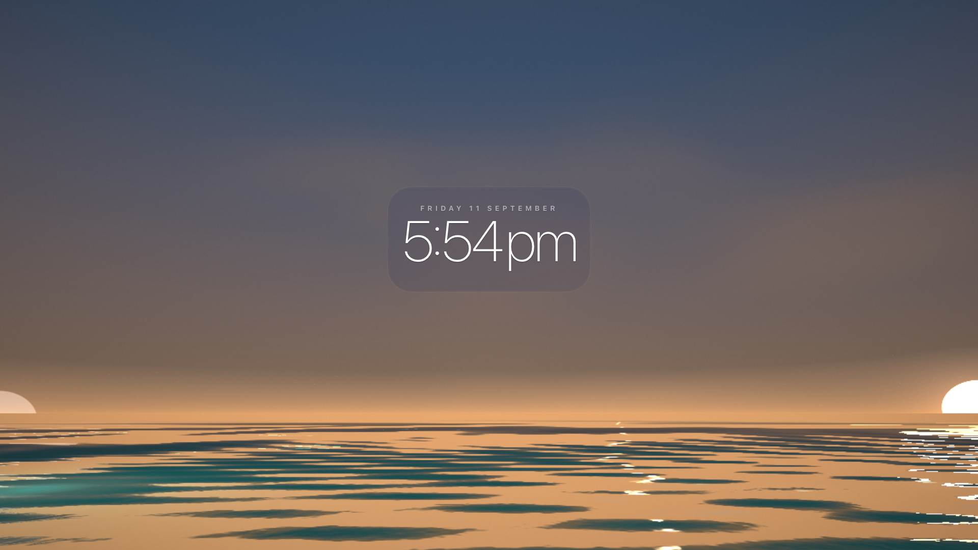 Ocean Clock at 5:54pm, warm golden hour light spreading across the water