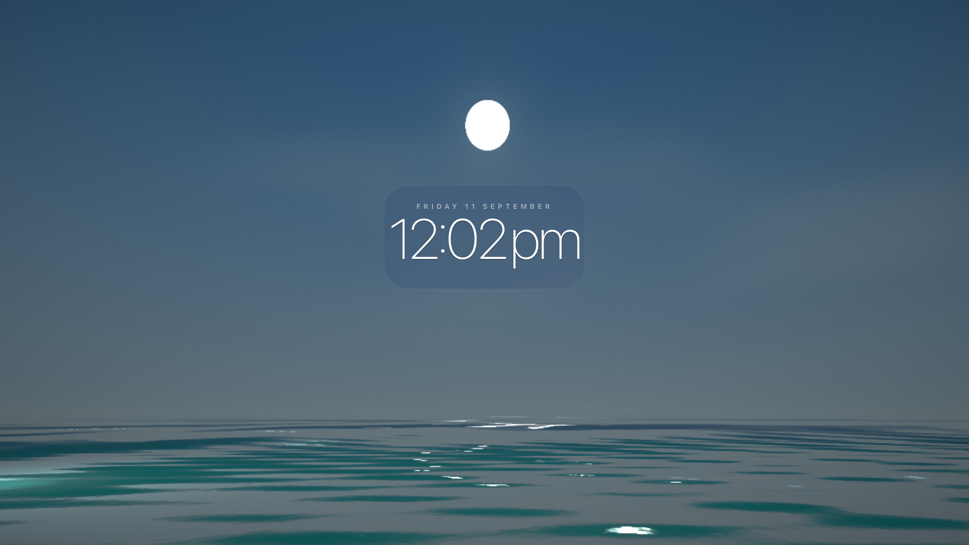 Ocean Clock at 12:02pm, a bright sun overhead reflecting on the sea